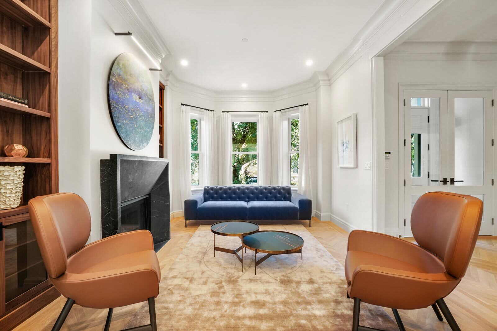 Living room with crown molding and freshly painted walls