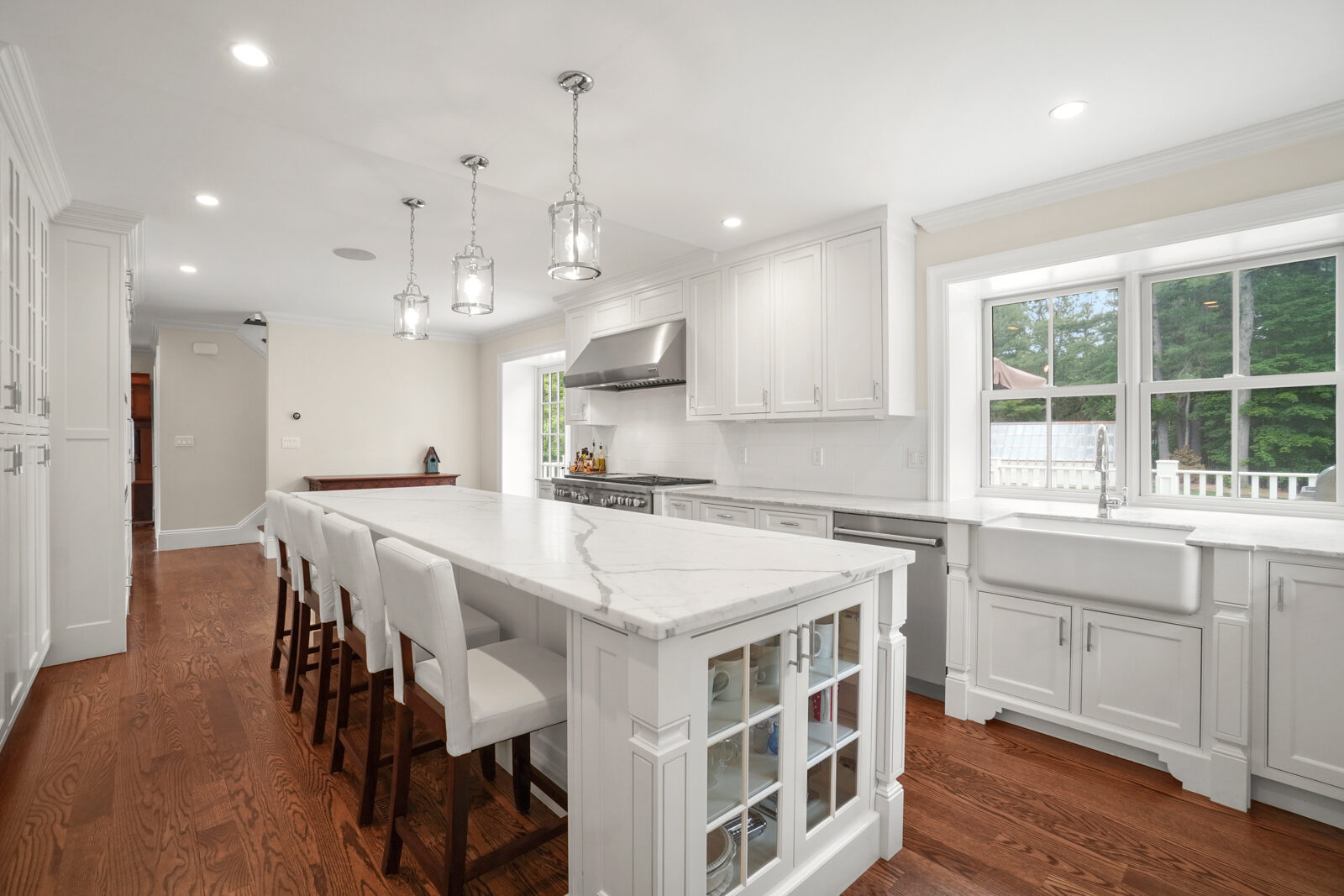 White kitchen with painted cabinetry and island