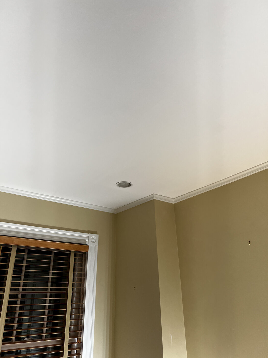 Ceiling repaired and painted smooth